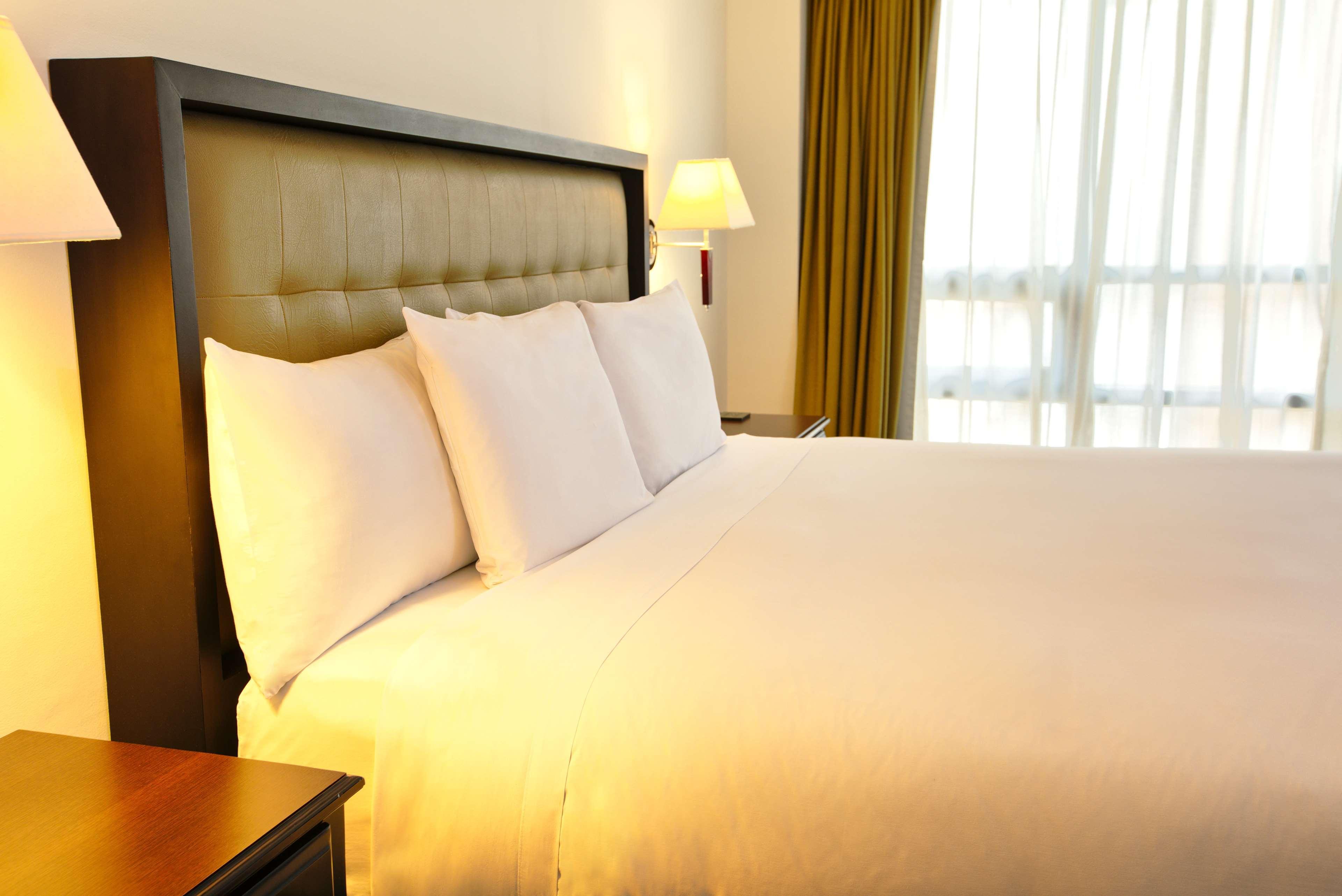 Wyndham Garden Guatemala City Exterior photo A bed